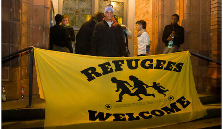 refugees-welcome-germany-e1630994570579.jpg