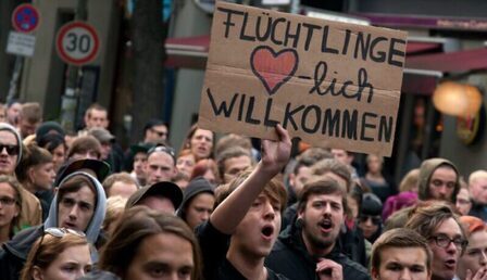 refugees_welcome_berlin-e1653993524280-900x550-1-e1667407726248.jpeg