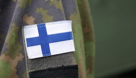 Flag_of_Finland_in_army_uniform_20180604-e1649921720246.jpg