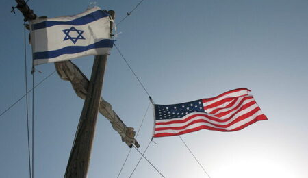 American_and_Israeli_Flags_on_Mast_0844-scaled-e1679901723289.jpg
