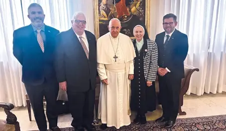 NWM-with-Pope-3-scaled-1-e1704712260912.webp