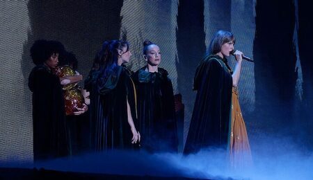 Taylor_Swift_Eras_Tour_-_Arlington_TX_-_Evermore_Willow-e1709108927350.jpeg