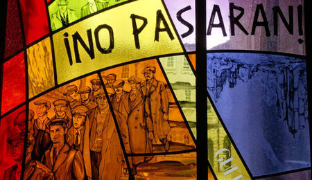 Stained_Glass_Commemorating_Irish_Volunteers_in_Spanish_Civil_War_-_City_Hall_-_Belfast_-_Northern_Ireland_-_UK_43550734882-scaled-e1721332507317.jpg